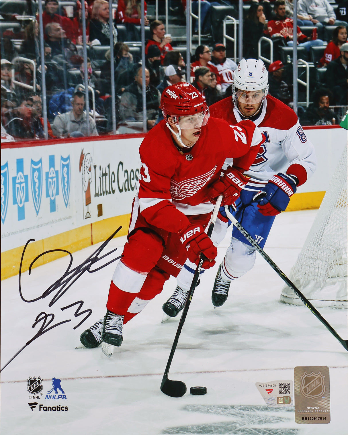Lucas Raymond Detroit Red Wings Signed 8x10 Red Jersey with Puck Photograph