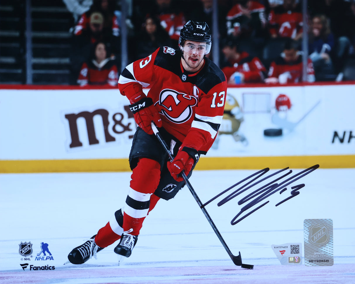 Nico Hischier New Jersey Devils Signed 8x10 Red Jersey with Puck Photograph