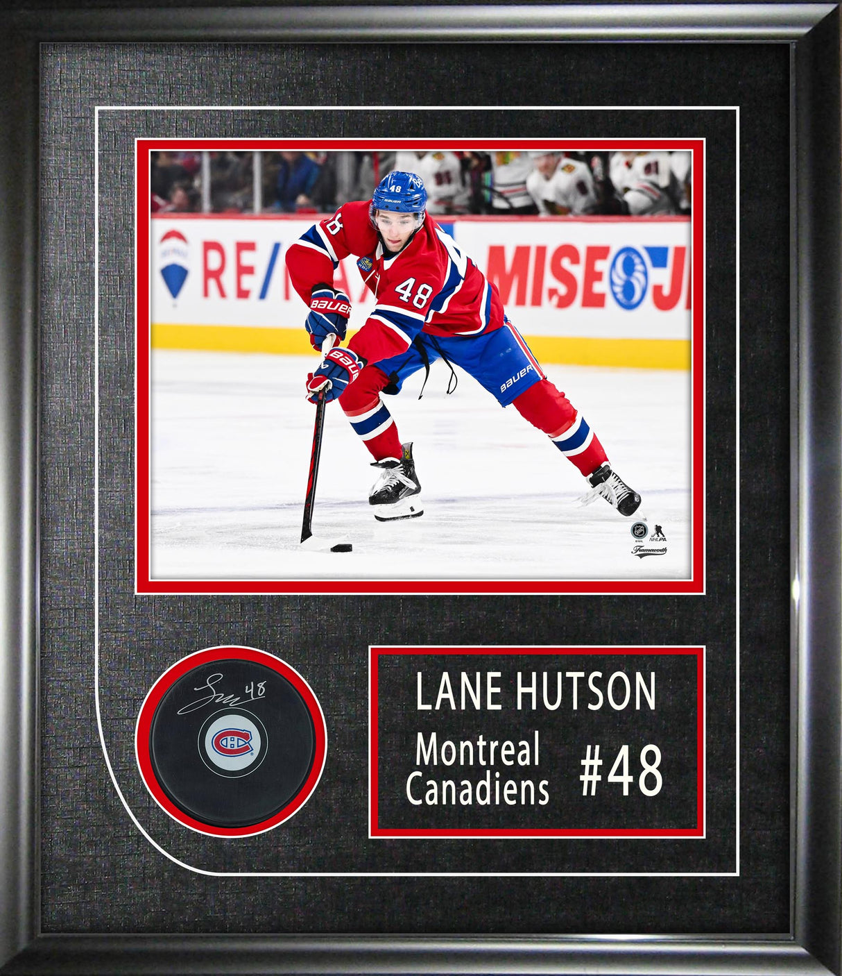 Lane Hutson Signed Puck Framed 17x19.5" Montreal Canadiens