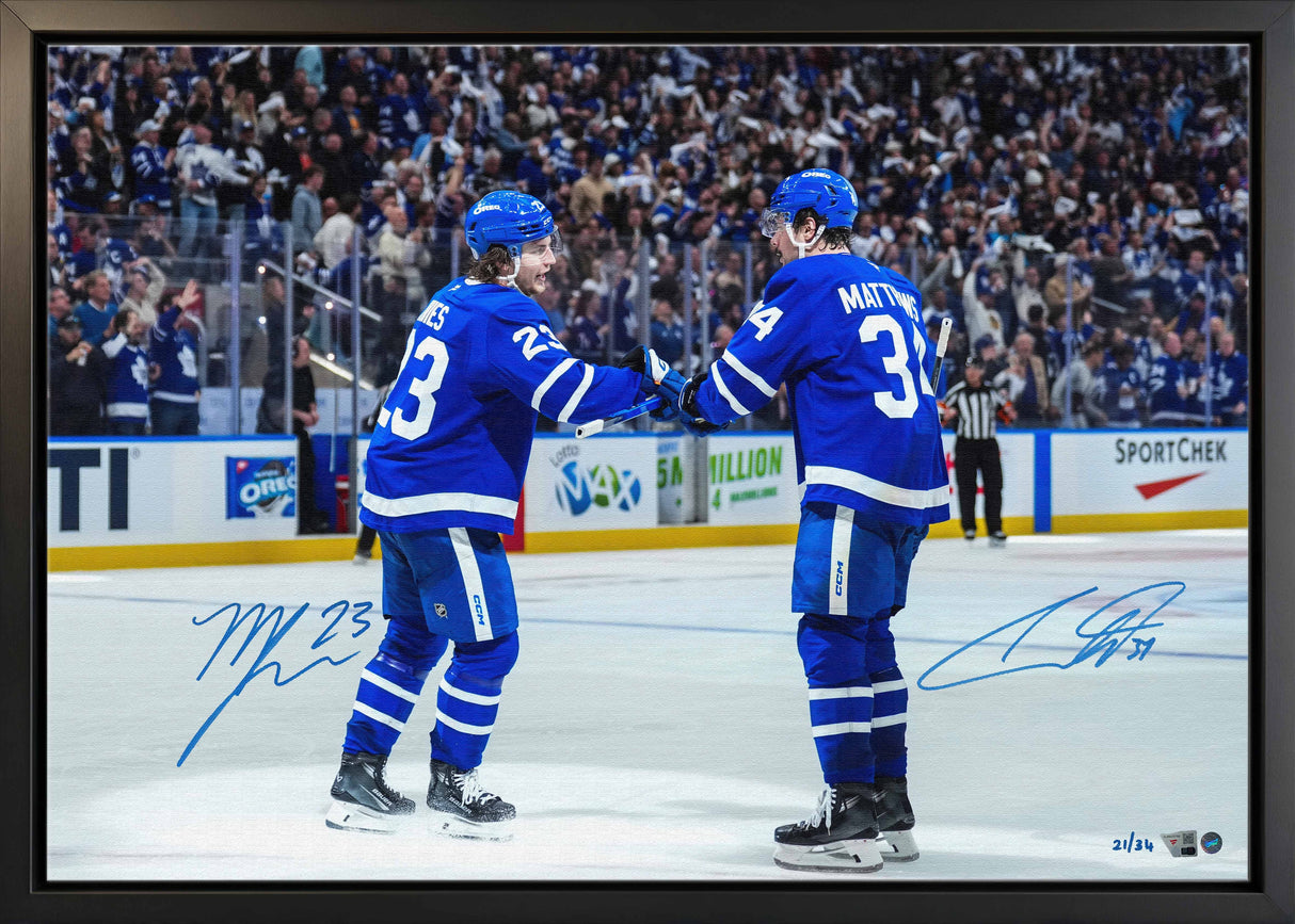 Auston Matthews and Matthew Knies Dual-Signed 20x29 Framed Canvas Maple Leafs Fist Pump Celebration-H (Limited Edition of 34) - AUCTION