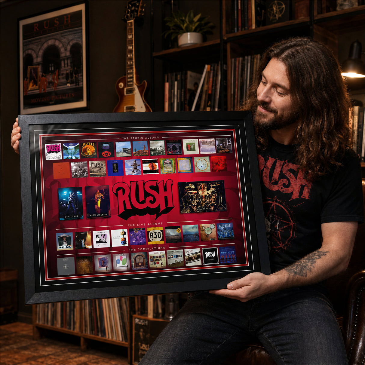 Rush fan holding the framed album collection collage