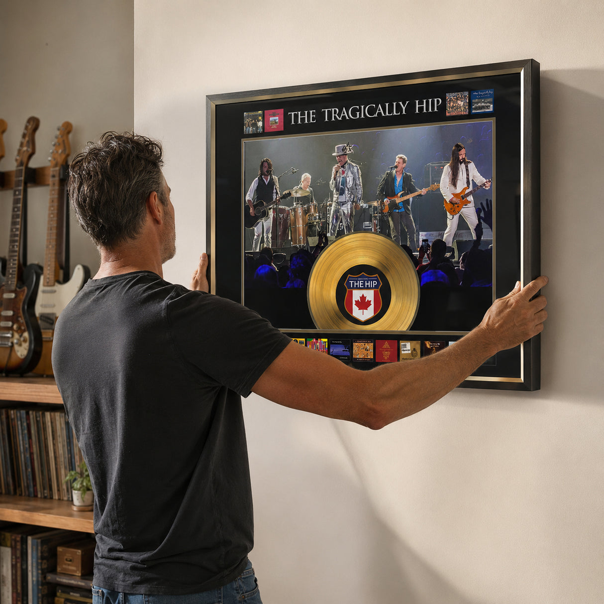 The Tragically Hip Framed Album Collage with Gold LP - Being installed on the wall