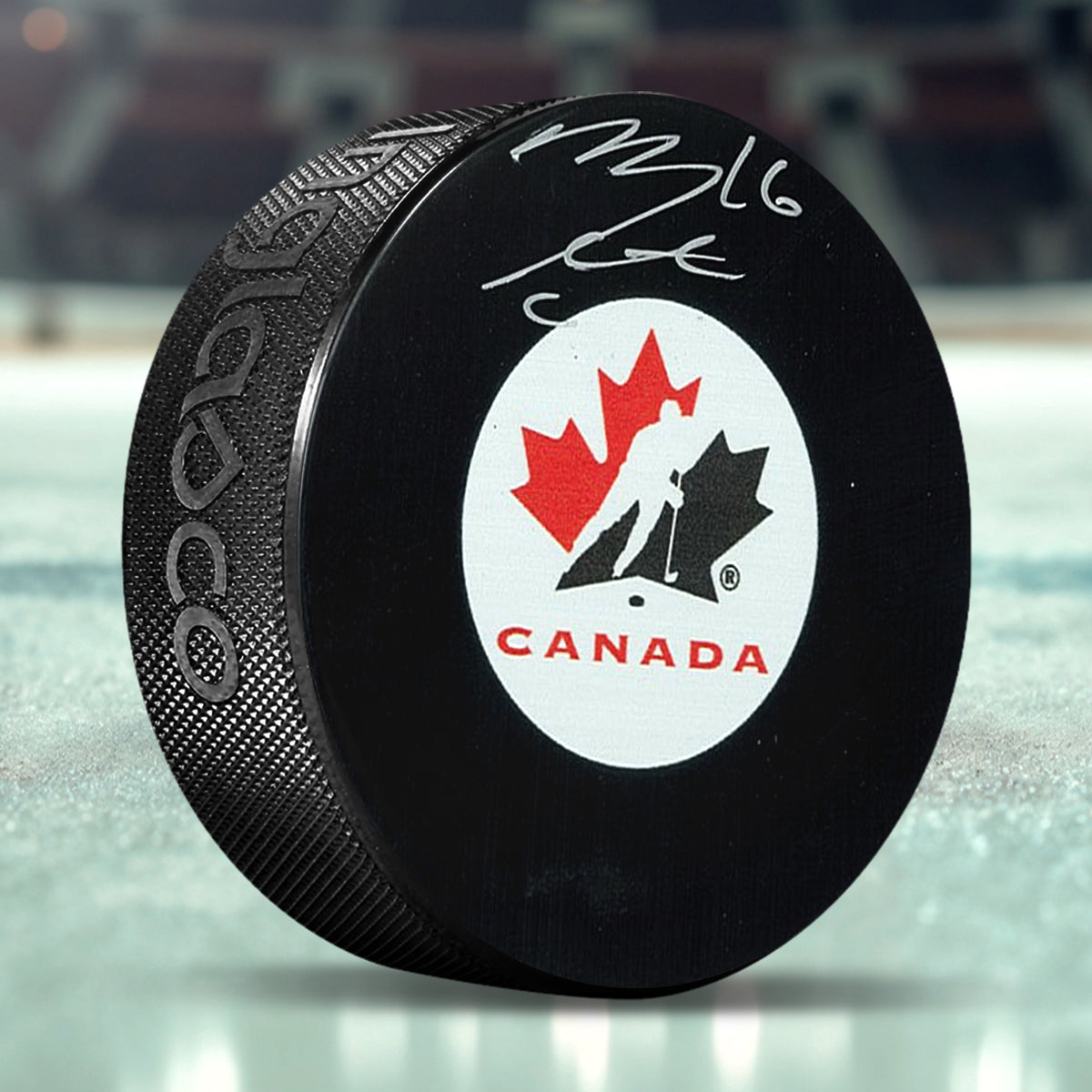 Mitch Marner Signed Puck Team Canada (#16) - AUCTION