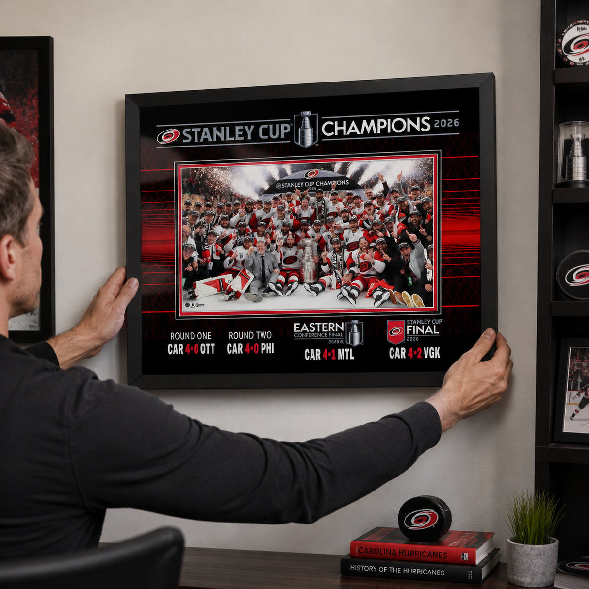 Carolina Hurricanes 16x20 Frame 2026 Stanley Cup Champions Team Celebration - hanging installation lifestyle image