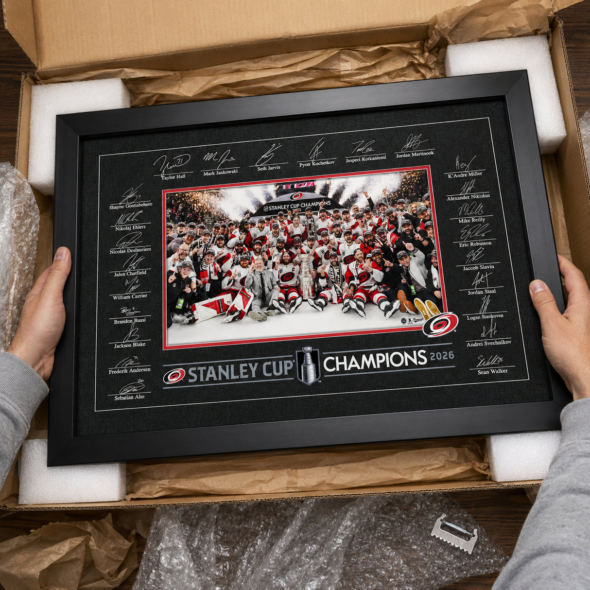 Carolina Hurricanes 24x36 Replica Signature Frame 2026 Stanley Cup Champions - unboxing lifestyle image
