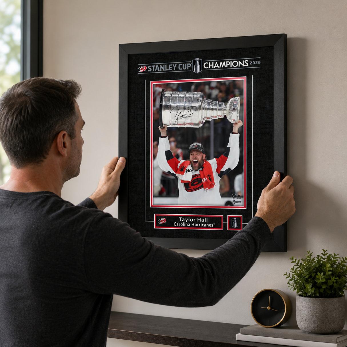 Taylor Hall 16x20 Replica Signature Frame Carolina Hurricanes 2026 Stanley Cup Champions - hanging installation lifestyle image
