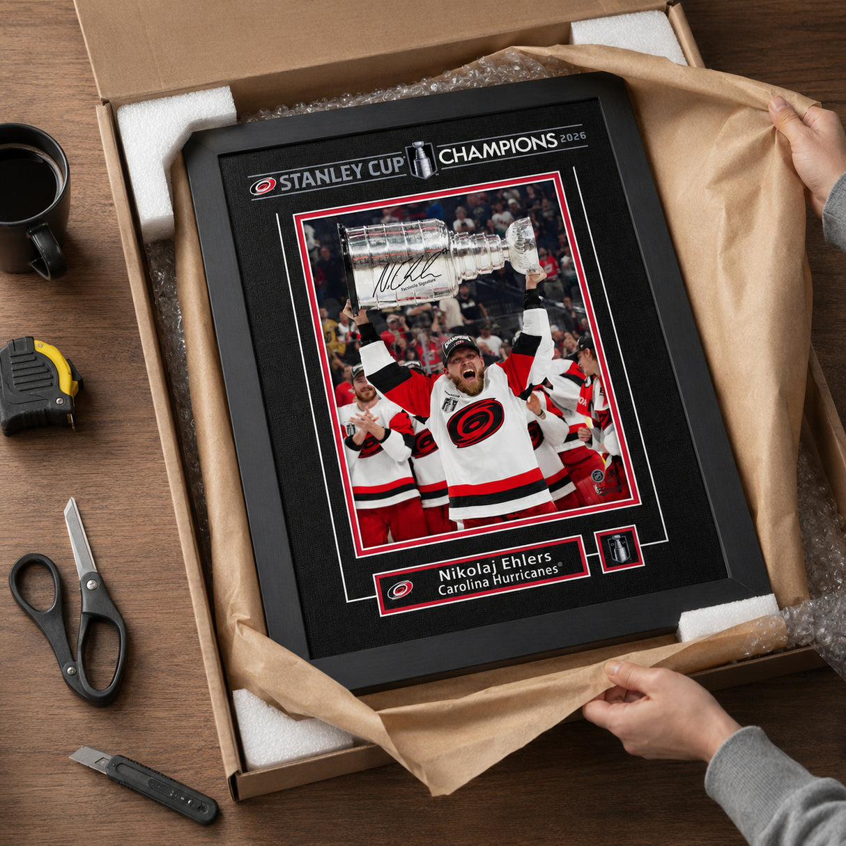 Nikolaj Ehlers 16x20 Replica Signature Frame Carolina Hurricanes 2026 Stanley Cup Champions - unboxing lifestyle image