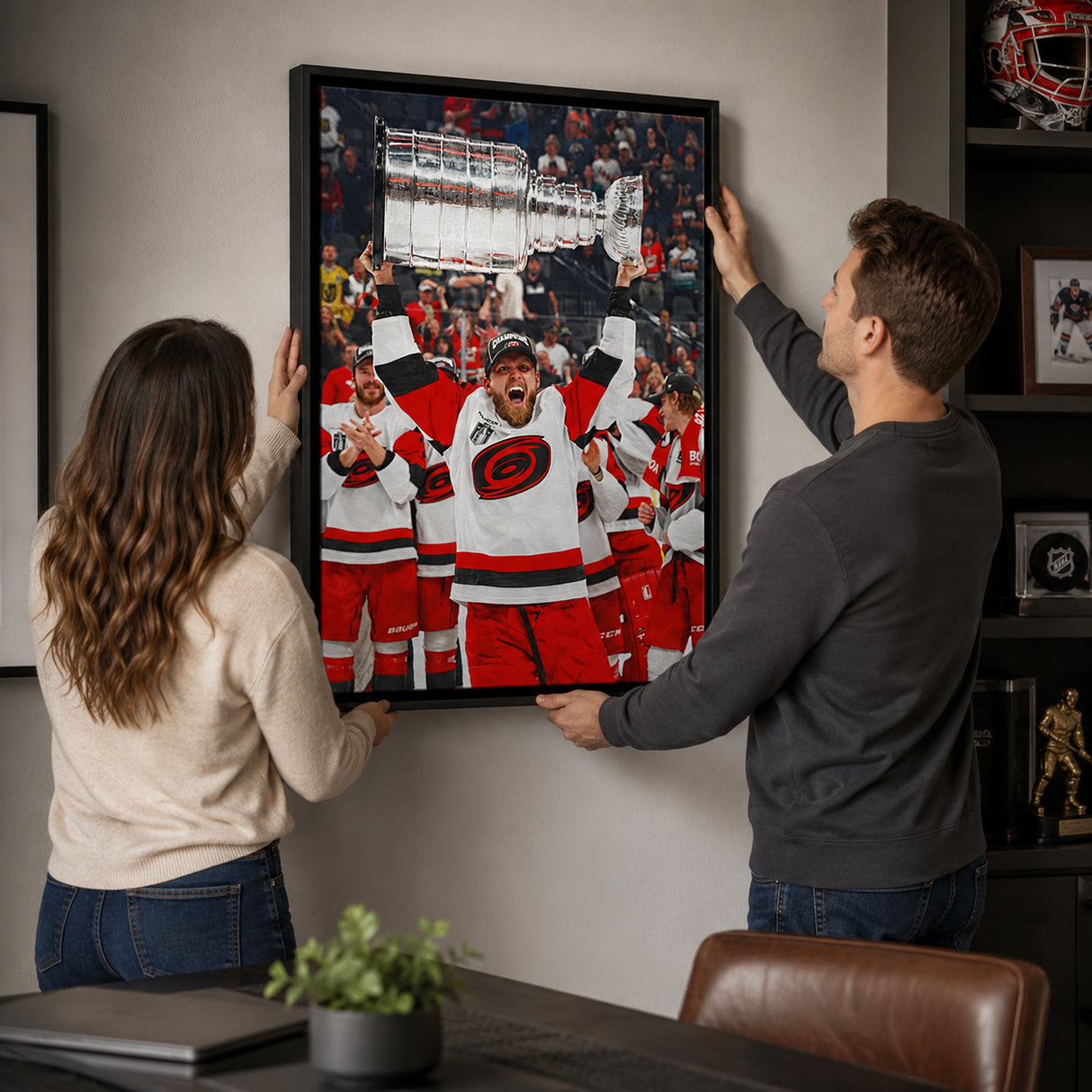 Nikolaj Ehlers 20x29 Framed Canvas Carolina Hurricanes 2026 Stanley Cup Champions - hanging installation lifestyle image