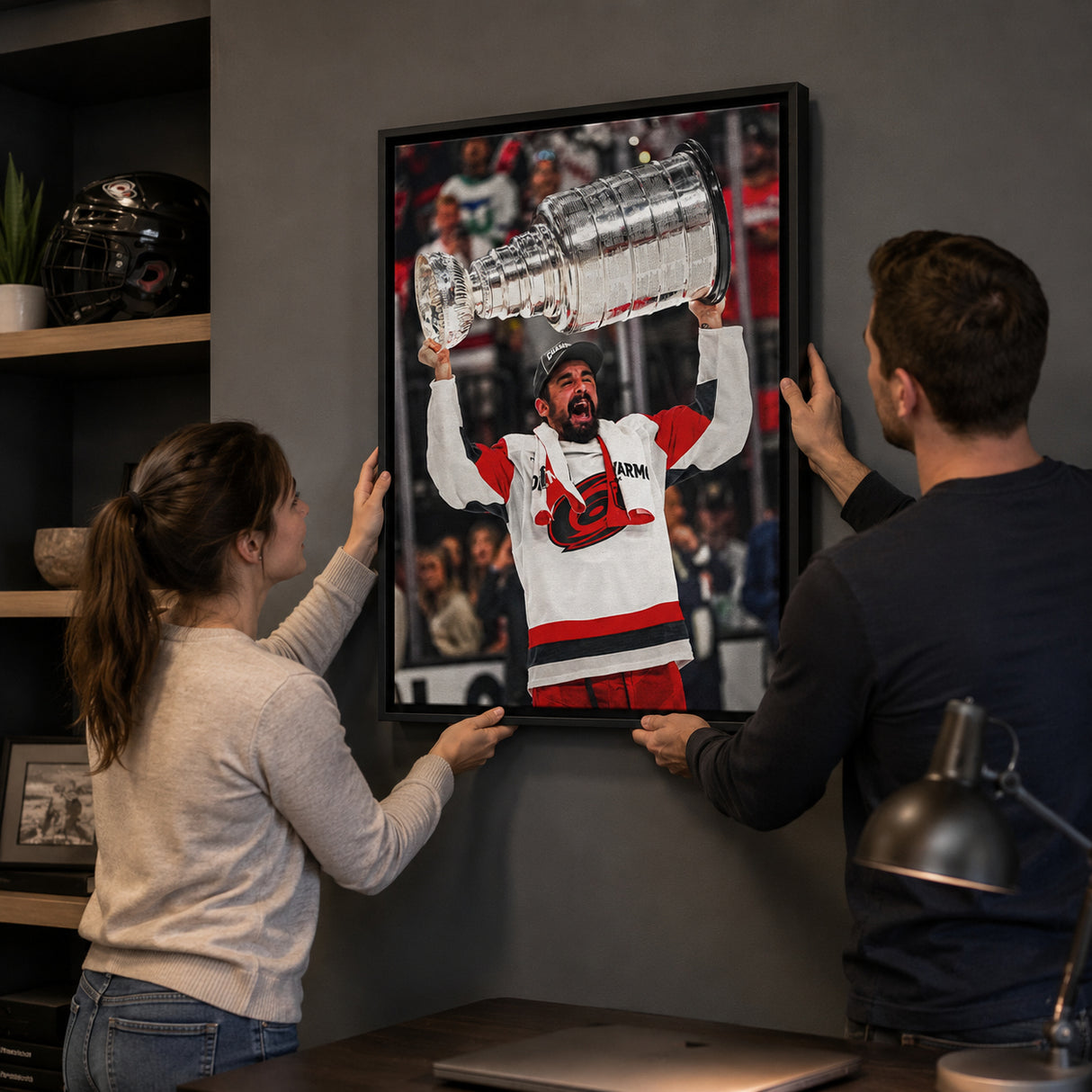 Seth Jarvis 20x29 Framed Canvas Carolina Hurricanes 2026 Stanley Cup Champions - hanging installation lifestyle image