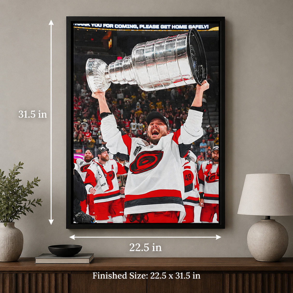 Sebastian Aho 20x29 Framed Canvas Carolina Hurricanes 2026 Stanley Cup Champions - unboxing lifestyle image