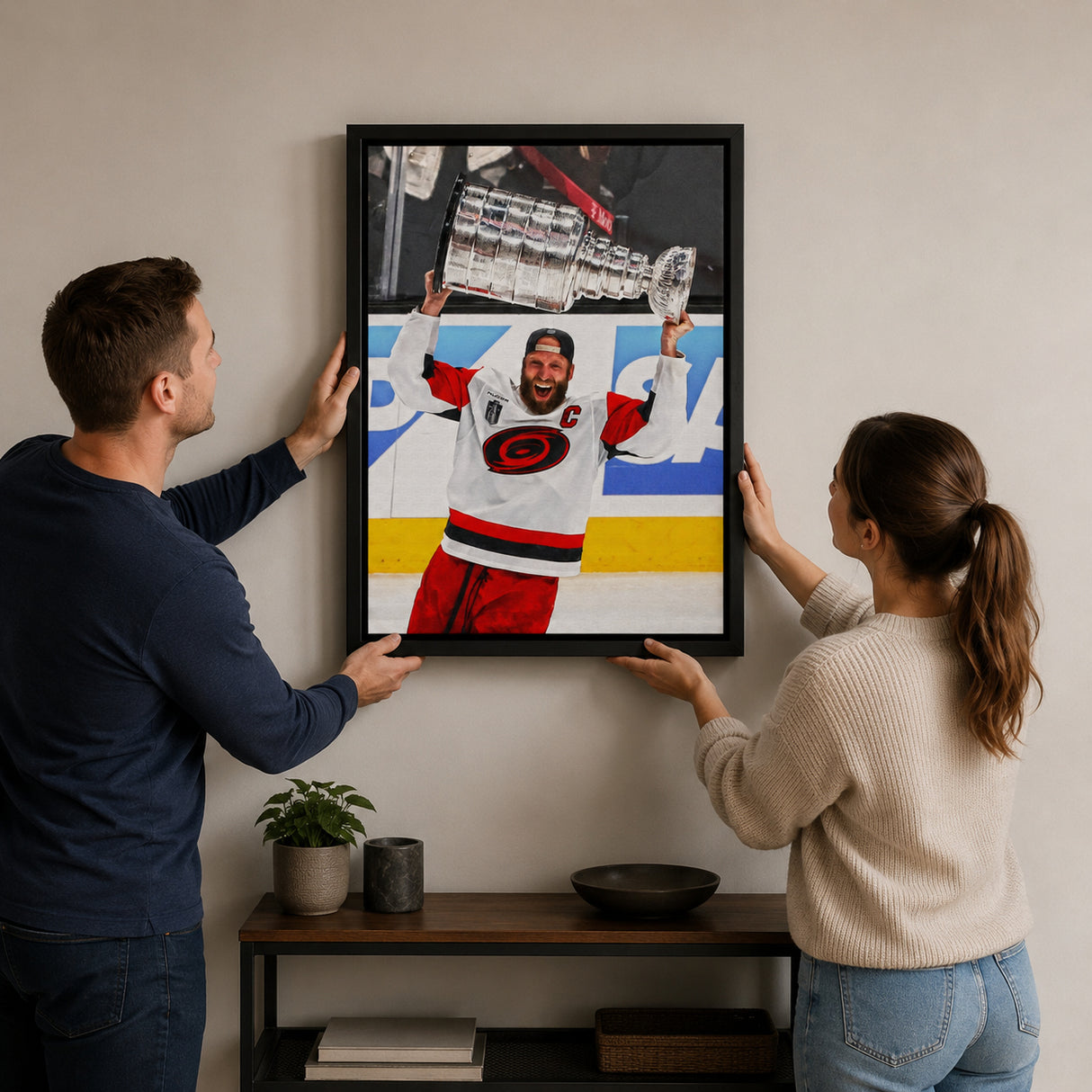 Jordan Staal 20x29 Framed Canvas Carolina Hurricanes 2026 Stanley Cup Champion - hanging installation lifestyle image