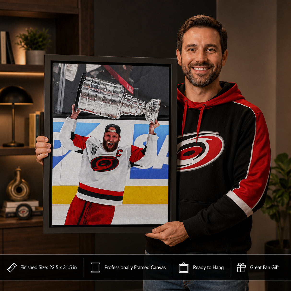Jordan Staal 20x29 Framed Canvas Carolina Hurricanes 2026 Stanley Cup Champion - collector holding framed canvas image