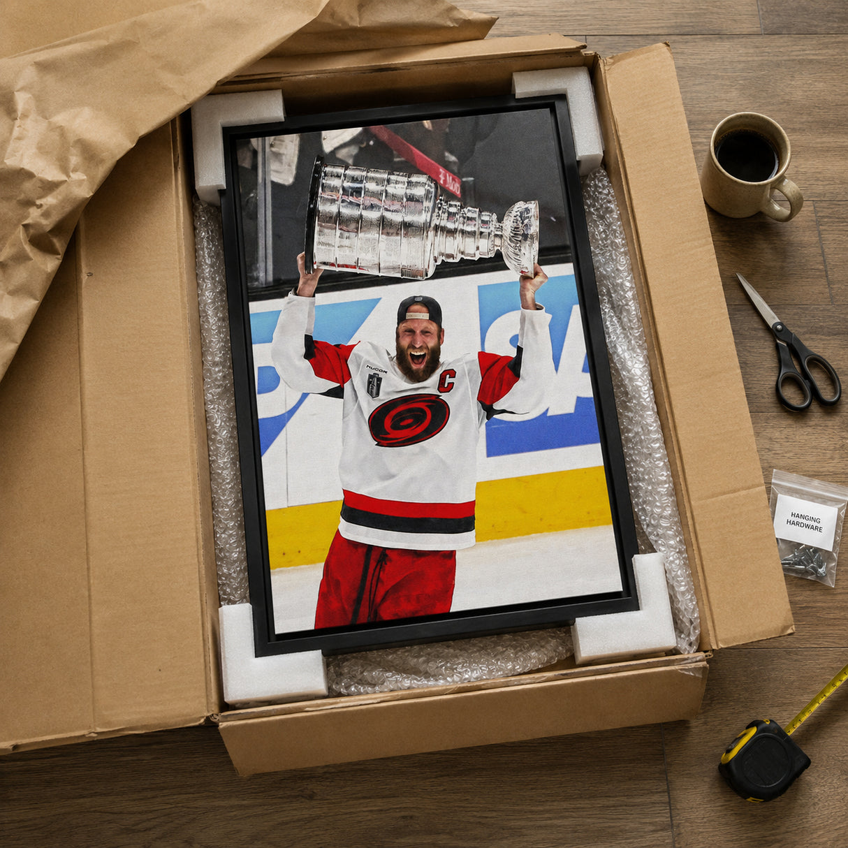 Jordan Staal 20x29 Framed Canvas Carolina Hurricanes 2026 Stanley Cup Champion - unboxing lifestyle image