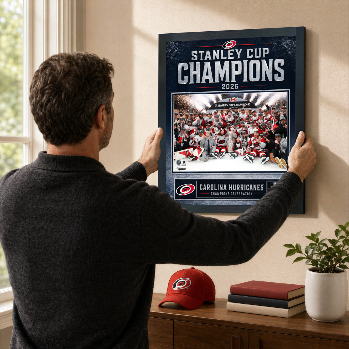 Carolina Hurricanes 2026 Stanley Cup Champions Ice Design PhotoGlass frame shown being hung as wall art