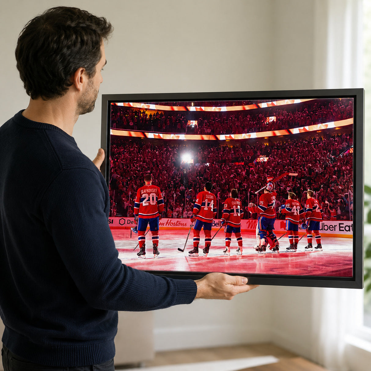 Montreal Canadiens 2026 NHL Playoffs Canvas — collector inspecting frame