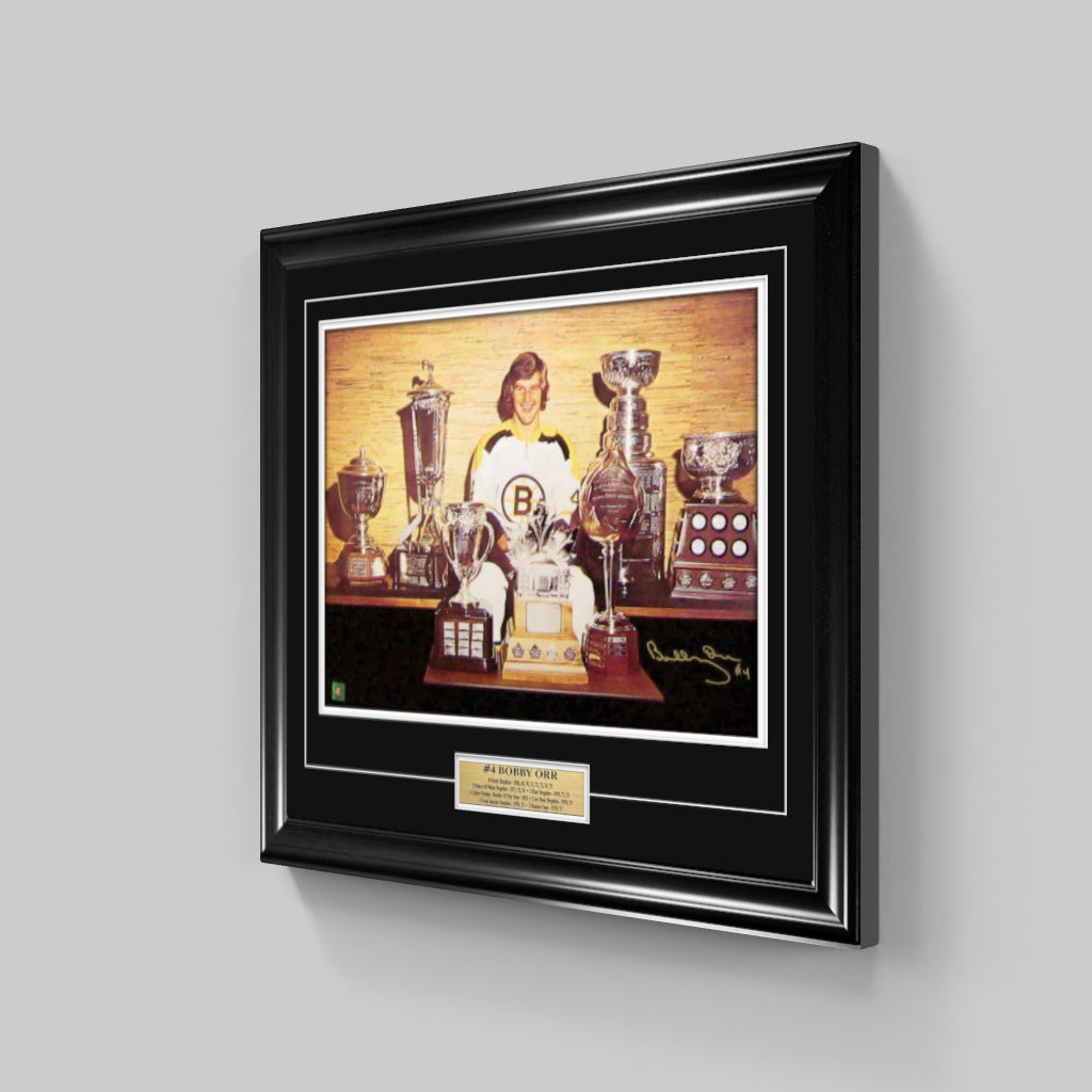 Bobby Orr Signed and Framed 18" x 24" Boston Bruins Trophies Photo - Frameworth Sports Canada