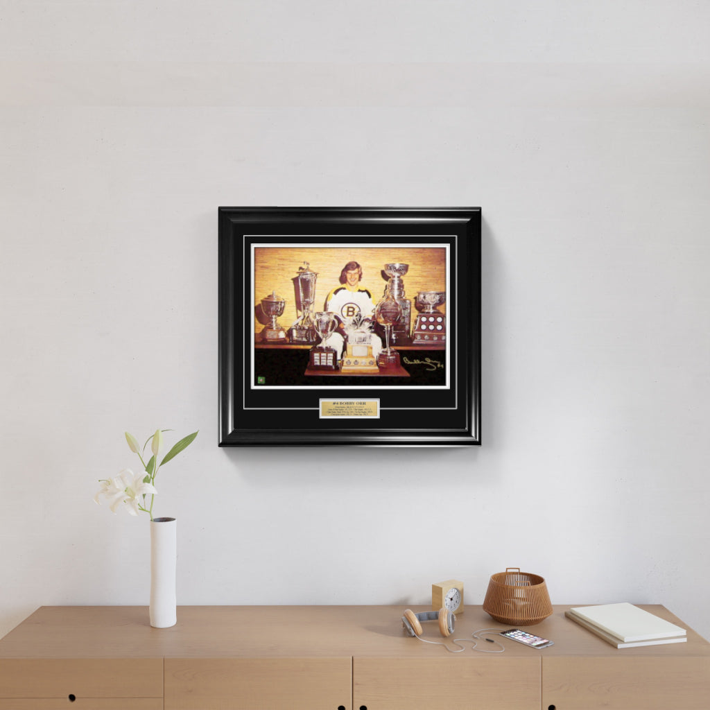 Bobby Orr Signed and Framed 18" x 24" Boston Bruins Trophies Photo - Frameworth Sports Canada