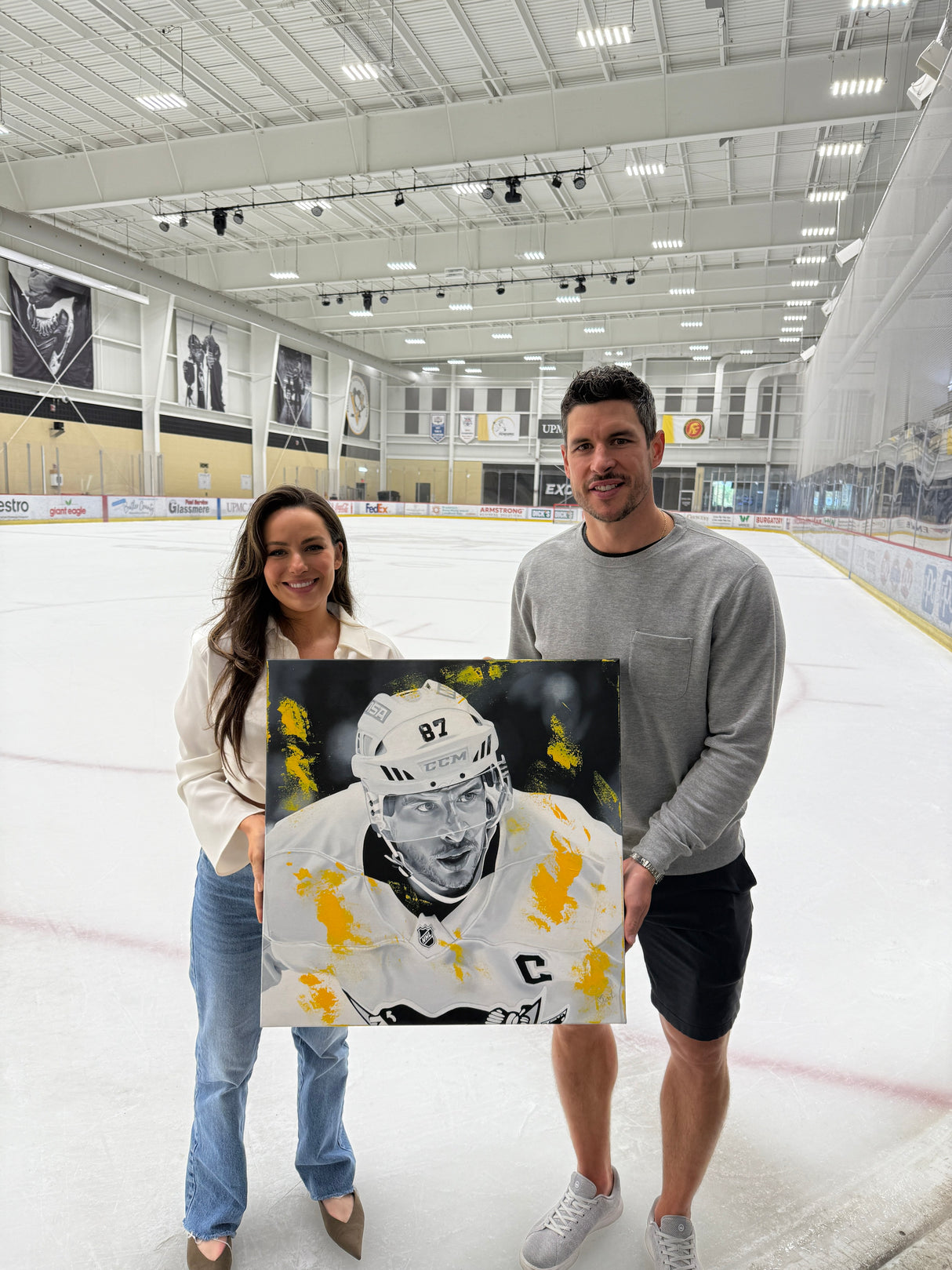Sidney Crosby painting with artist Kait Schoeb and attendees