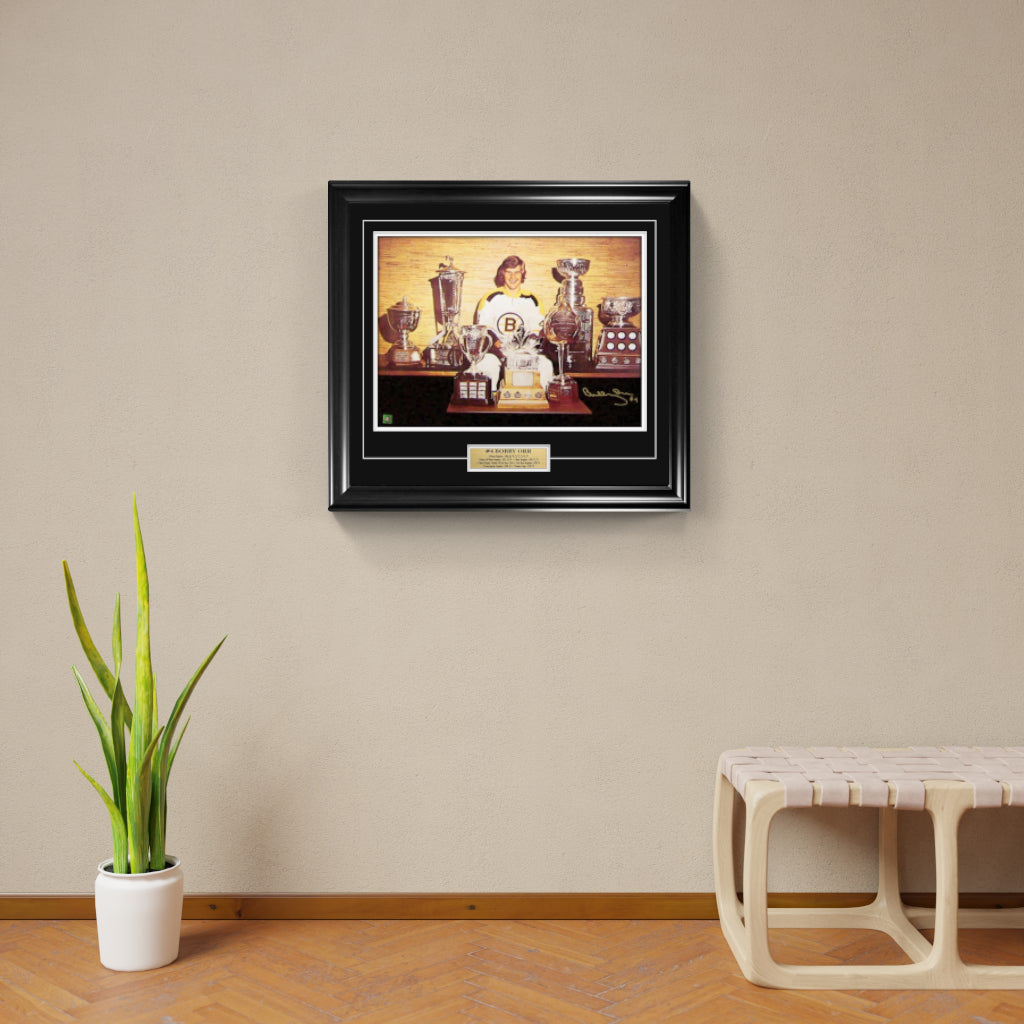 Bobby Orr Signed and Framed 18" x 24" Boston Bruins Trophies Photo - Frameworth Sports Canada