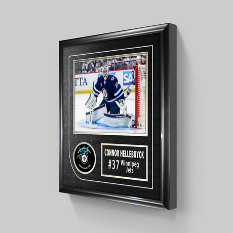 Connor Hellebuyck Winnipeg Jets Signed Framed Official Hockey Puck