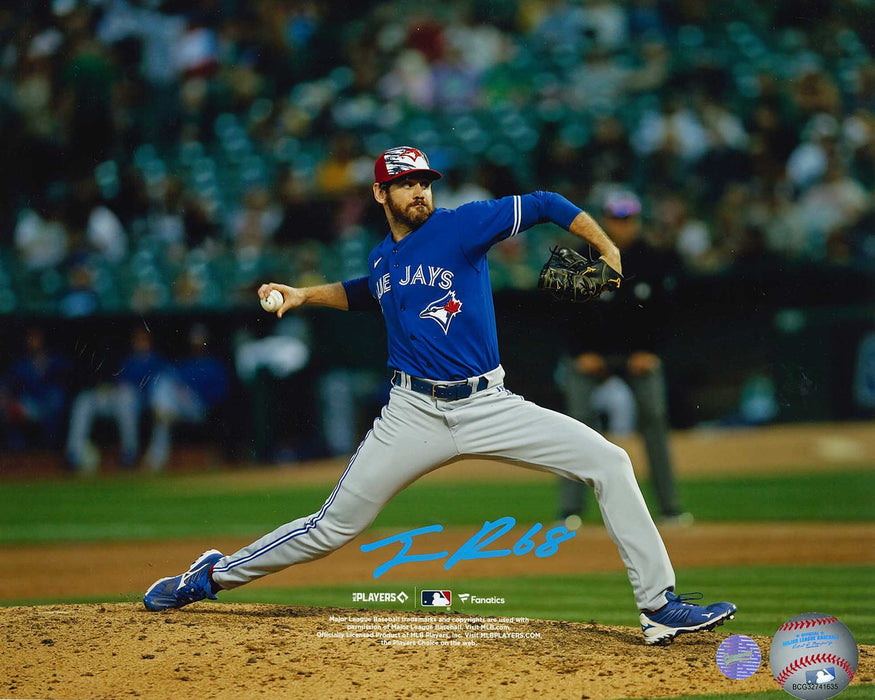 Jordan Romano 8x10 Signed Unframed Photo Blue Jays Blue Wind Up Front View-H - Frameworth Sports Canada 