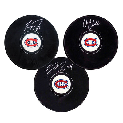 Nick Suzuki, Cole Caufield, and Carey Price Signed Montreal Canadiens Puck Bundle