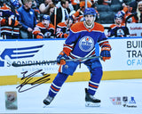 Evan Bouchard Edmonton Oilers Signed 8x10 Royal Jersey Skating Photograph