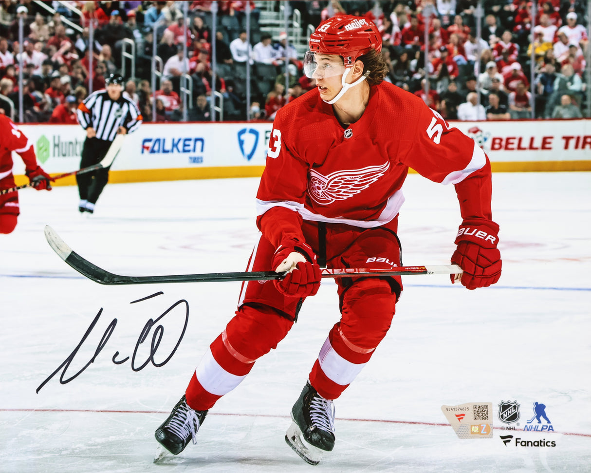 Moritz Seider Detroit Red Wings Signed 8x10 Red Jersey Skating Photograph