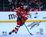 Nico Hischier New Jersey Devils Signed 8x10 Red Jersey with Puck Photograph