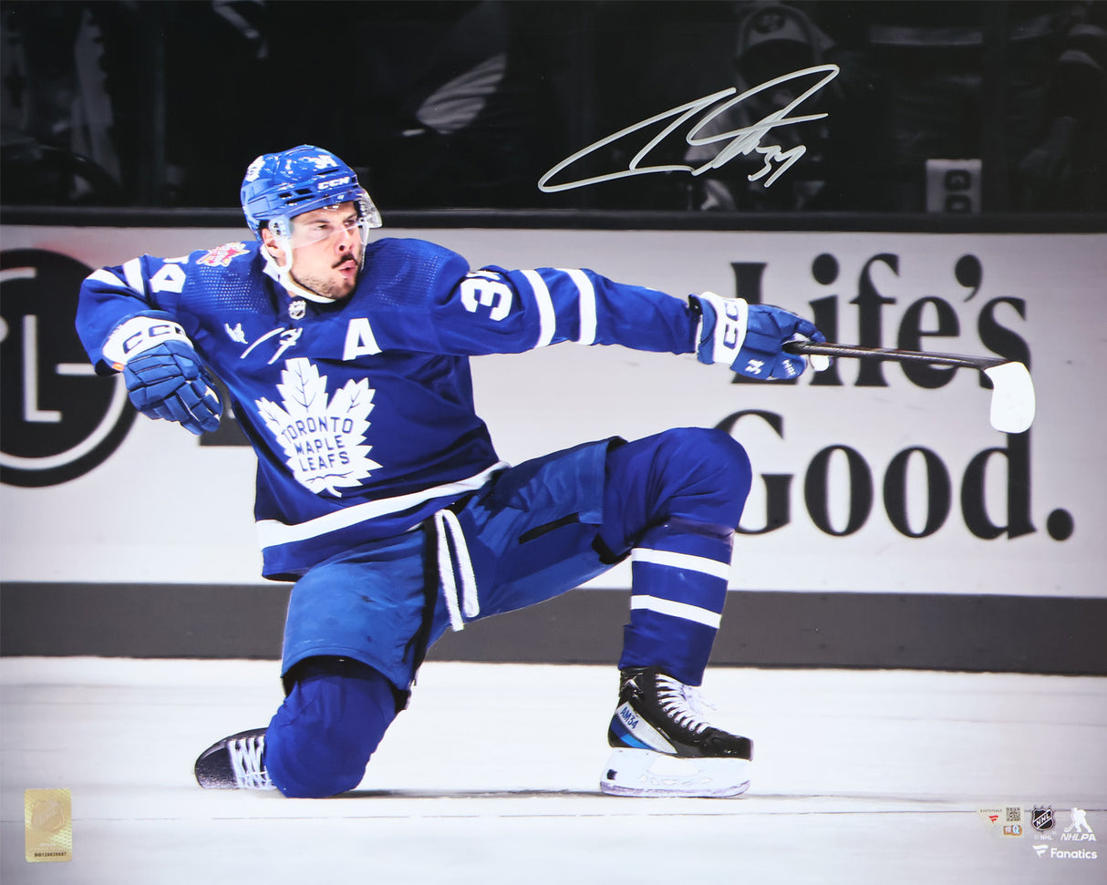 Auston Matthews Toronto Maple Leafs Signed 16x20 One Knee Celebrating Spotlight Photograph