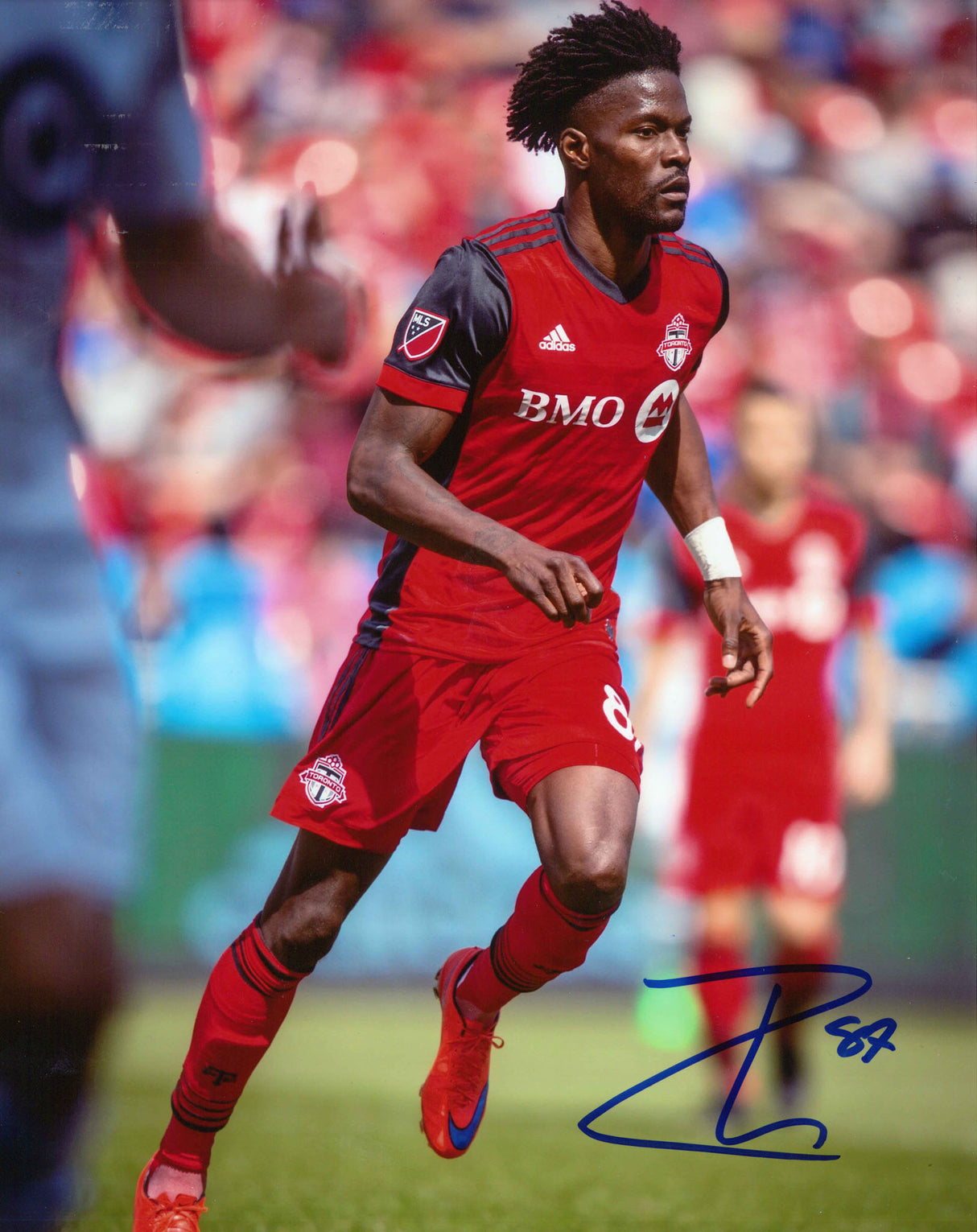 Tosaint Ricketts Toronto FC Signed Unframed 8x10 Action Photo - Frameworth Sports Canada 