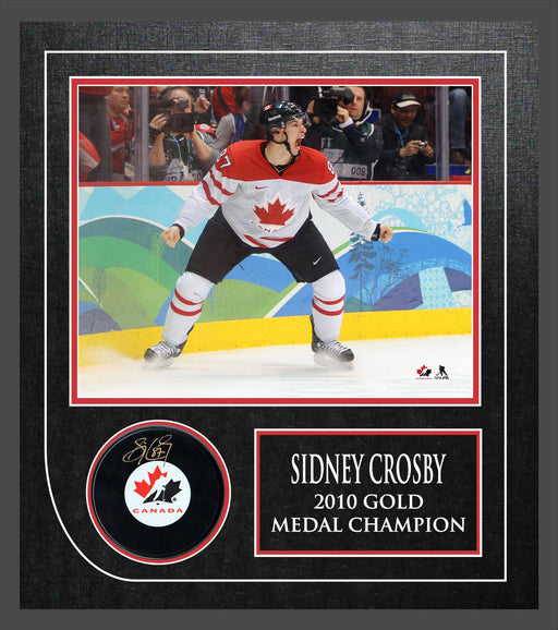 Sidney Crosby Signed Framed Team Canada Puck with 8x10 2010 Golden Goal Celebration Photo - Frameworth Sports Canada 