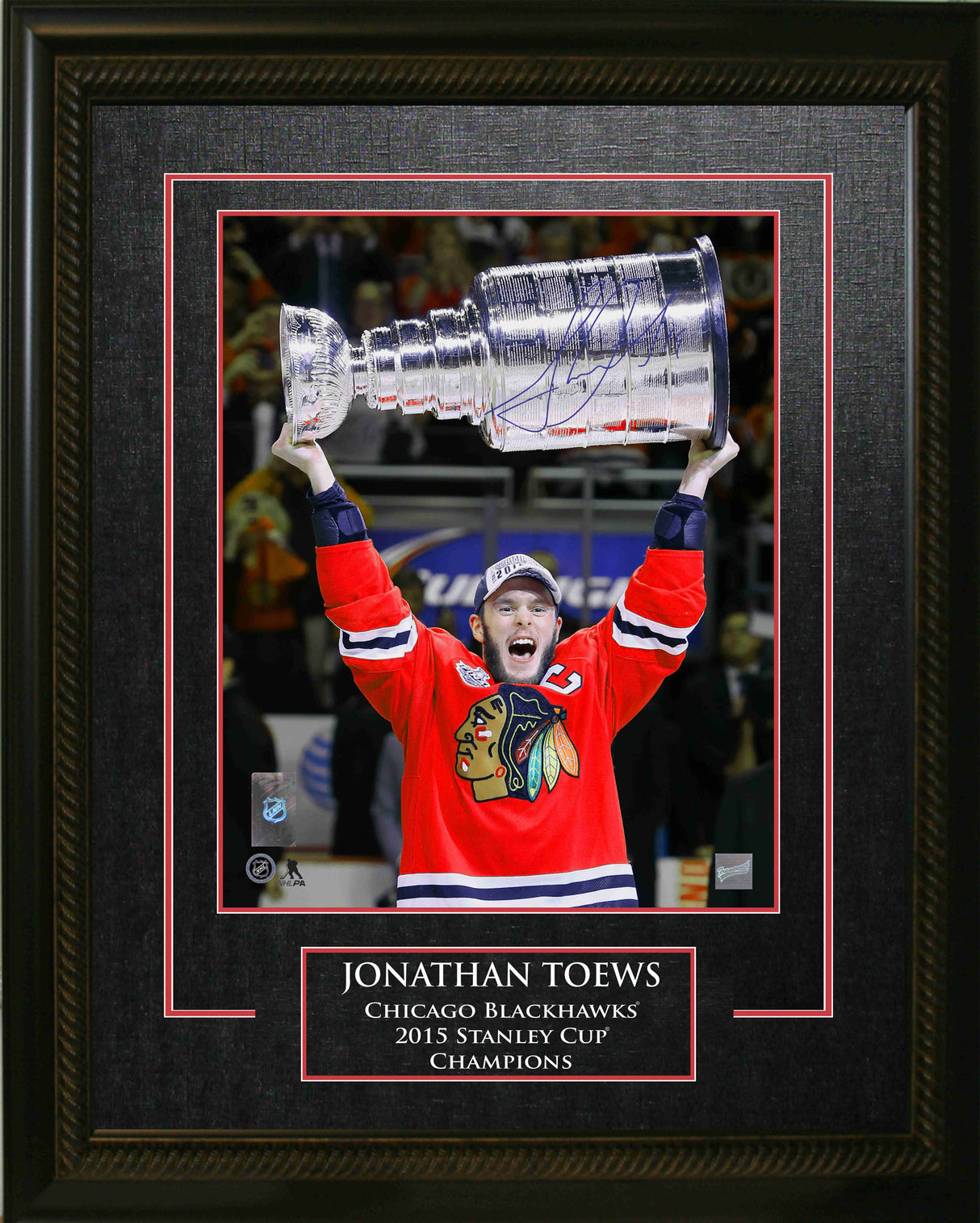 Jonathan Toews Chicago Blackhawks Signed Framed 16x20 Raising the 2015 Stanley Cup Photo - AUCTION