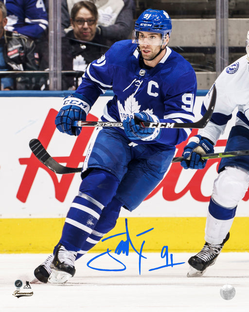 John Tavares Toronto Maple Leafs Signed 8x10 Action Photo - Frameworth Sports Canada 