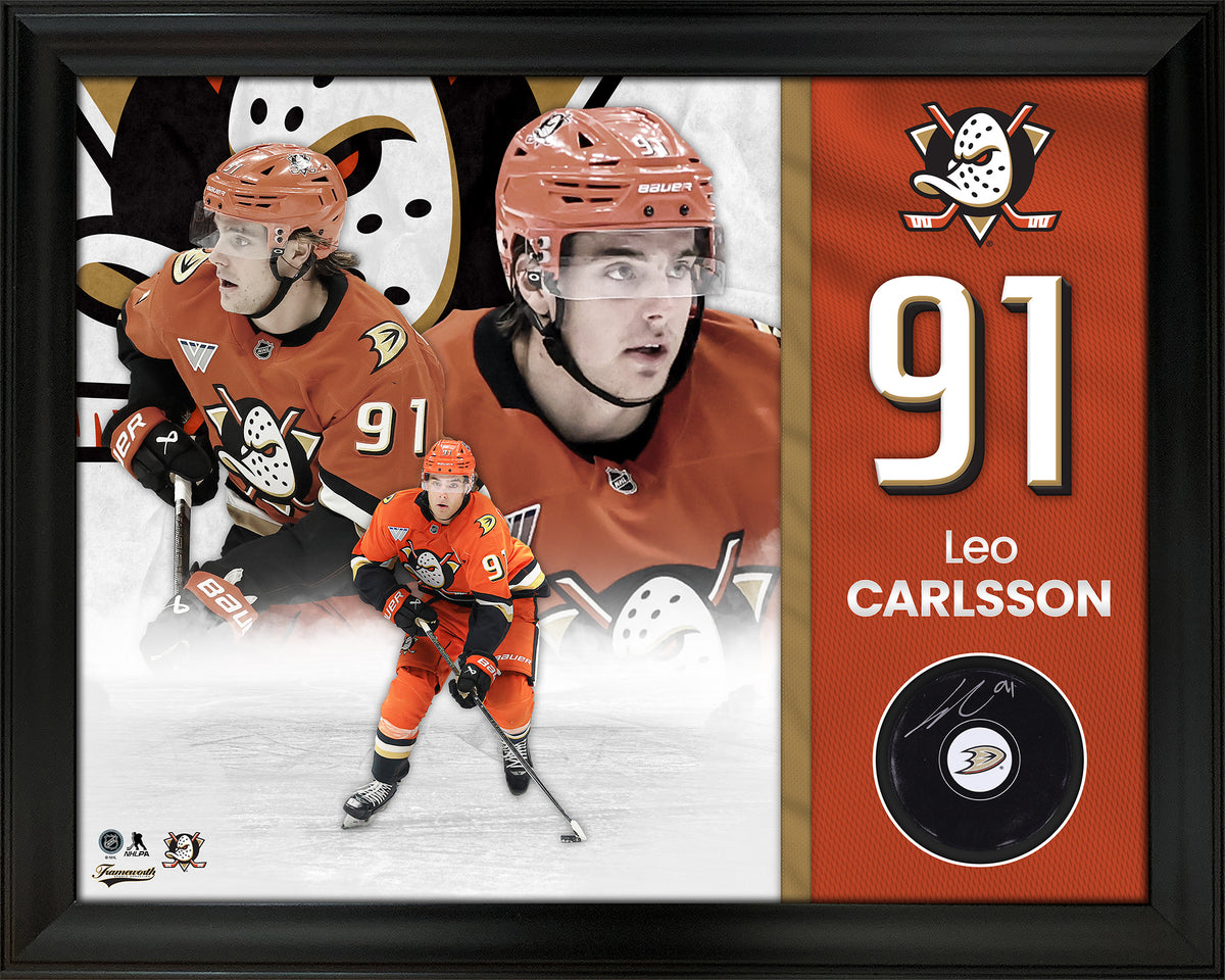 Leo Carlsson Signed Framed Anaheim Ducks Puck - AUCTION