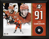 Leo Carlsson Signed Framed Anaheim Ducks Puck - AUCTION