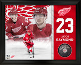 Lucas Raymond Signed Framed Detroit Red Wings Puck - AUCTION