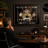 Rush Framed Album Collection Collage displayed in a home office music space