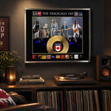 The Tragically Hip Framed Album Collage with Gold LP - Displayed above a record console in a music room