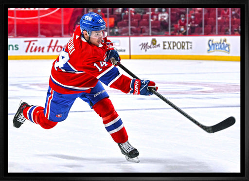 Nick Suzuki Montreal Canadiens Framed 20x29 Shooting Follow Through Canvas - Frameworth Sports Canada 
