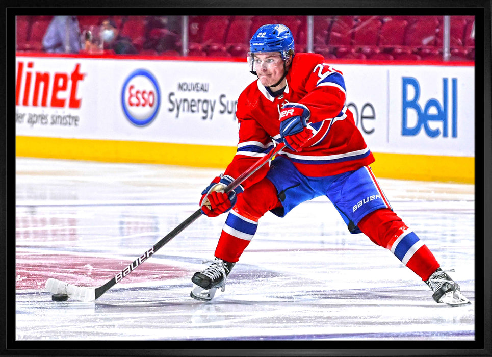 Cole Caufield Montreal Canadiens Framed 20x29 Passing Puck Canvas - Frameworth Sports Canada 