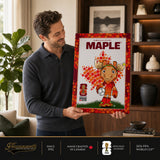 Maple the Moose FIFA World Cup plaque held for scale