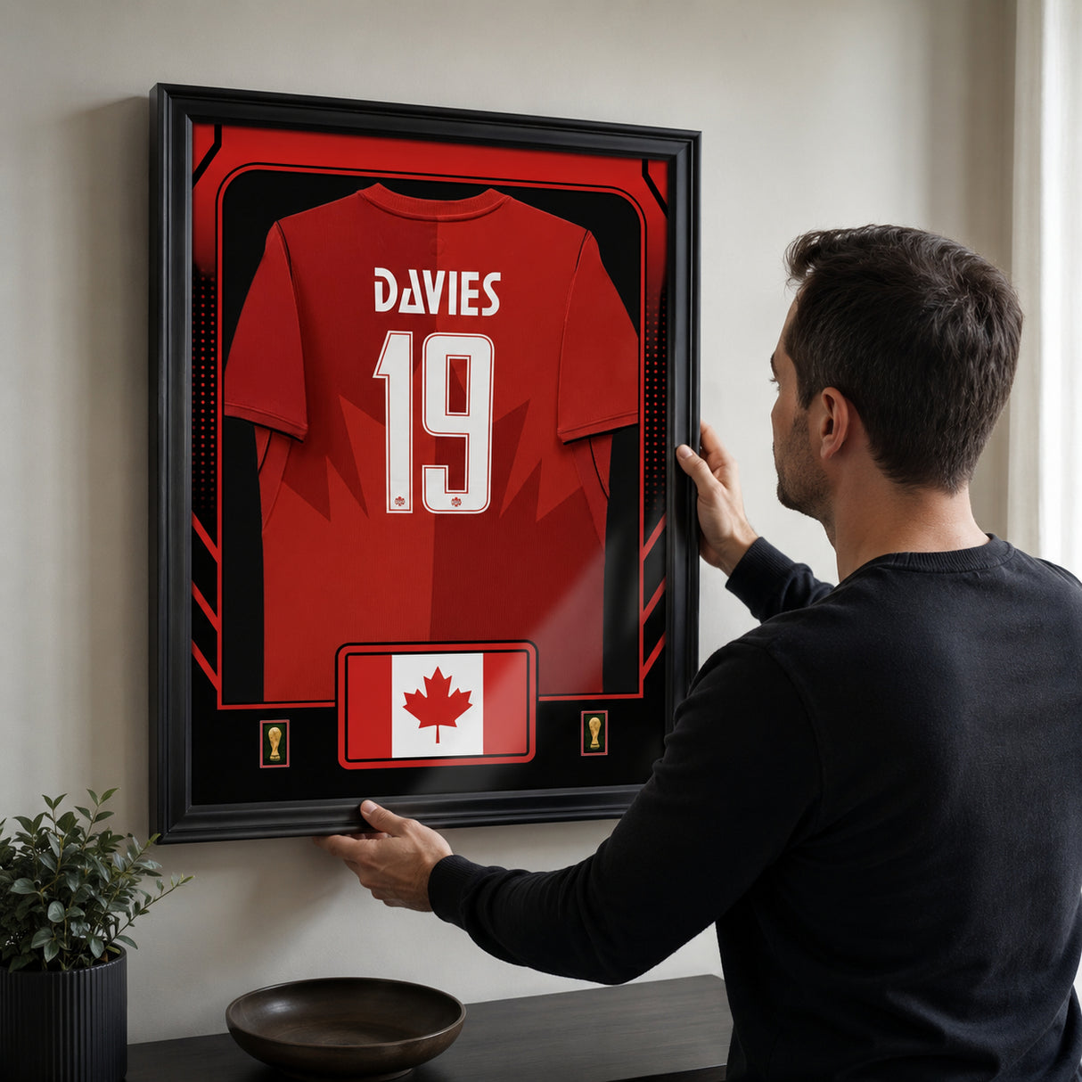 Alphonso Davies framed Canada FIFA World Cup 2026 jersey - Being installed on the wall