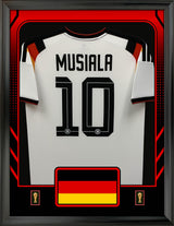 Jamal Musiala Framed 25.75 x 33.75 FIFA World Cup 2026 Germany Official Home Stadium Replica Adidas Jersey - AUCTION