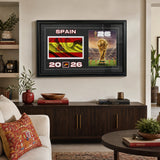 Team Spain 2026 World Cup Flag & Trophy Framed Print 15x24 — Wall-mounted lifestyle in a clean modern living room
