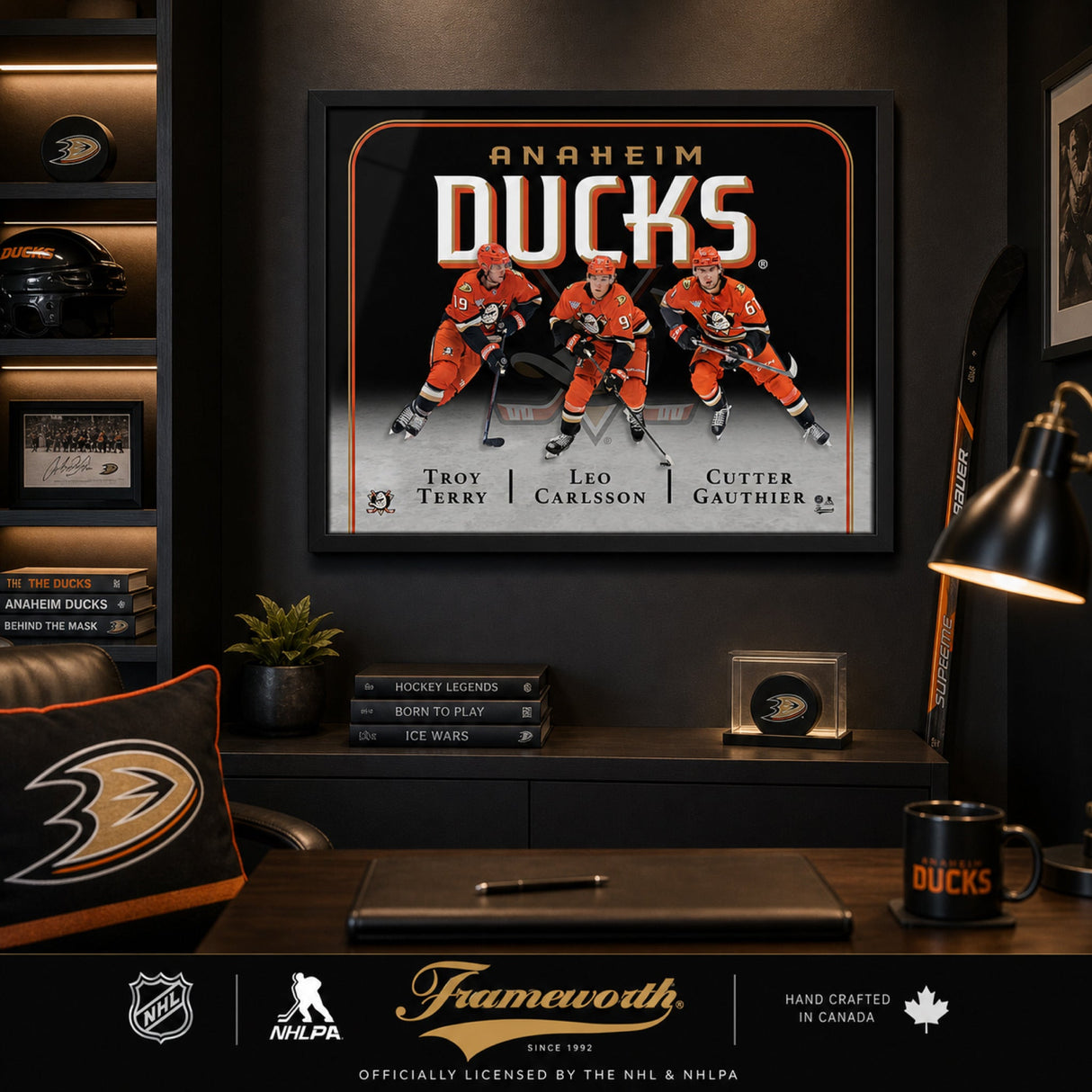 Anaheim Ducks Triple Player Collage Frame in dark Ducks fan cave with helmet display and team books – Frameworth