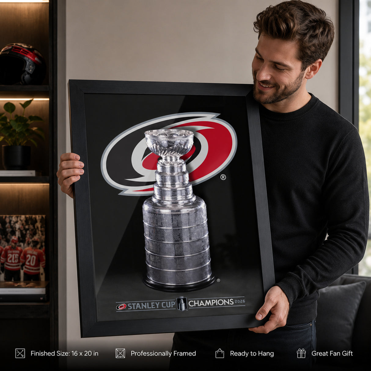 Carolina Hurricanes 16x20 Frame 2026 Stanley Cup Champions - collector holding framed print image