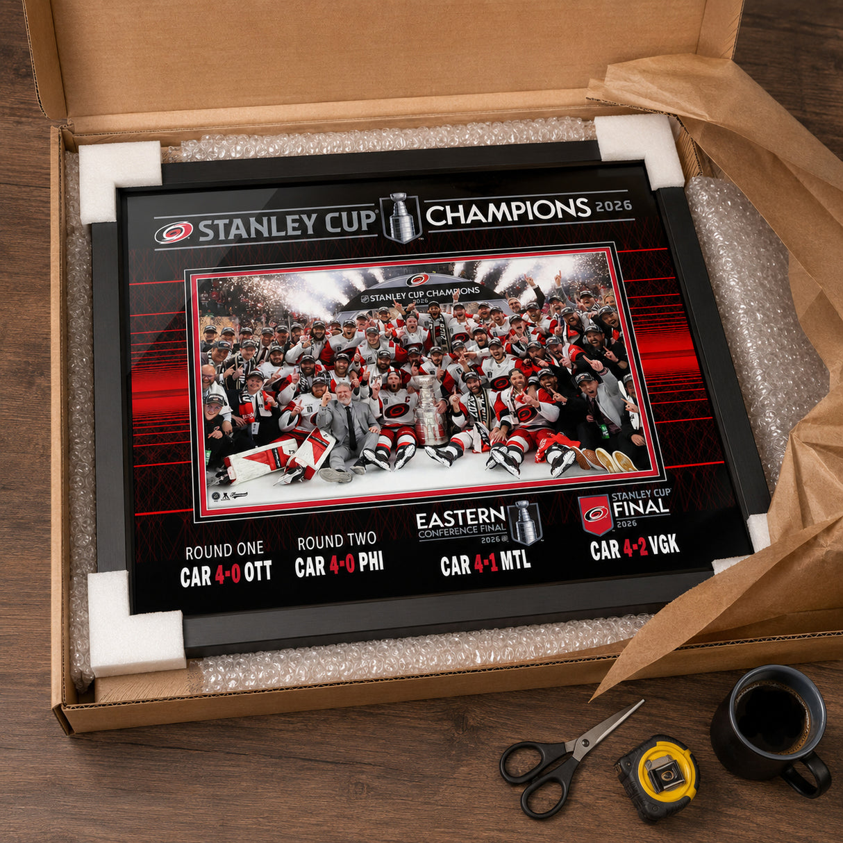 Carolina Hurricanes 16x20 Frame 2026 Stanley Cup Champions Team Celebration - collector holding framed print image