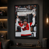 Taylor Hall 20x29 Framed Canvas Carolina Hurricanes 2026 Stanley Cup Champions - display wall lifestyle image