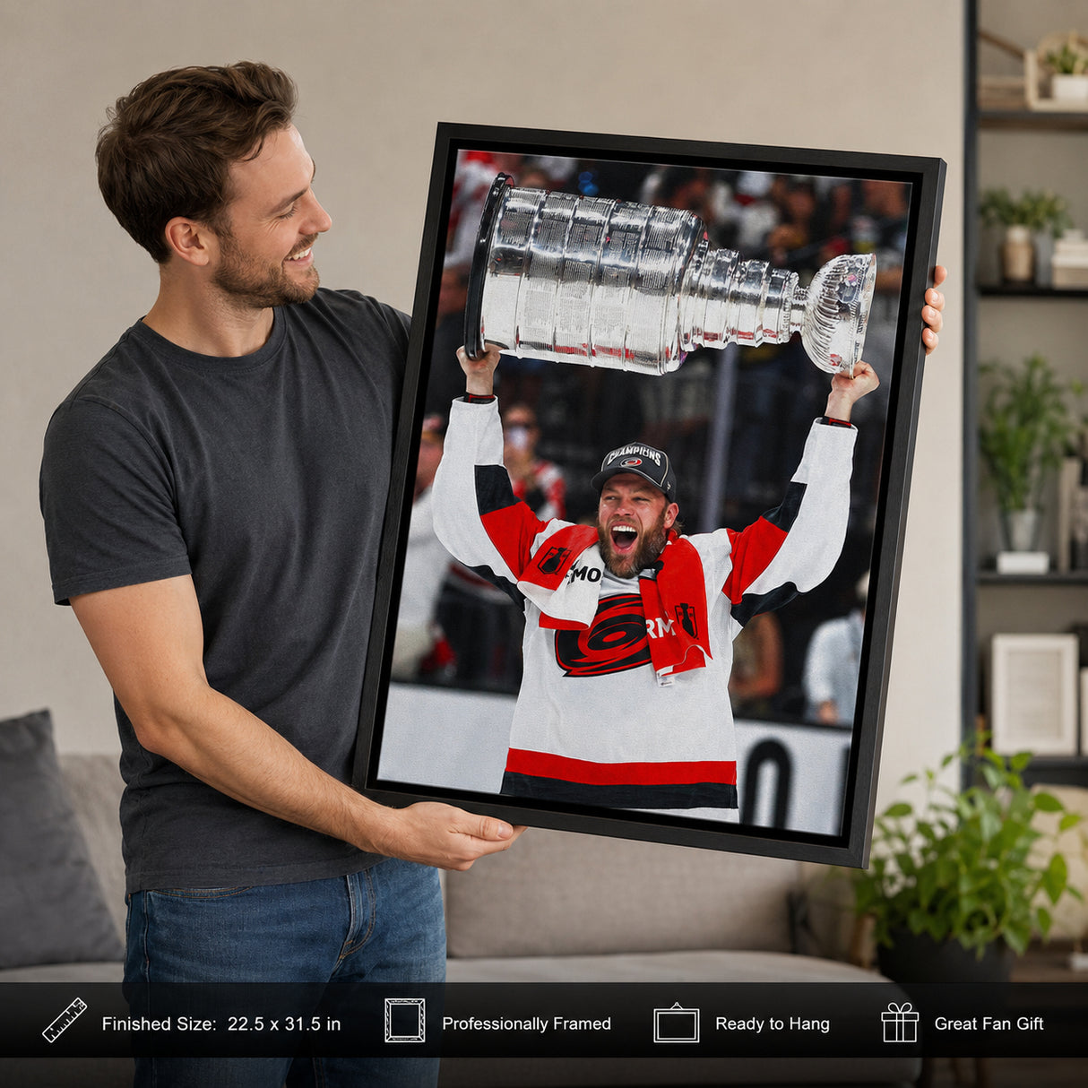 Taylor Hall 20x29 Framed Canvas Carolina Hurricanes 2026 Stanley Cup Champions - collector holding framed canvas image